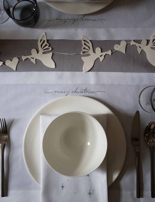 Sets de table en lin blanc avec texte brodé "Merry Christmas" en argent