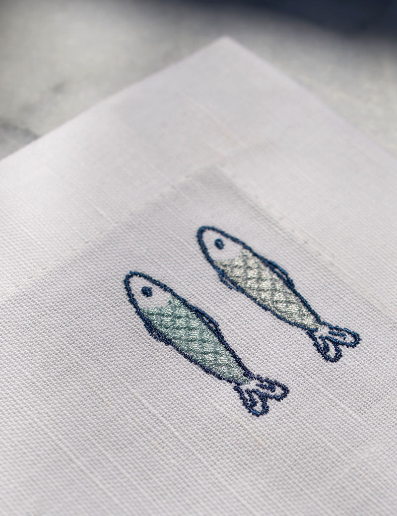 White Linen Placemats with Embroidered Fish