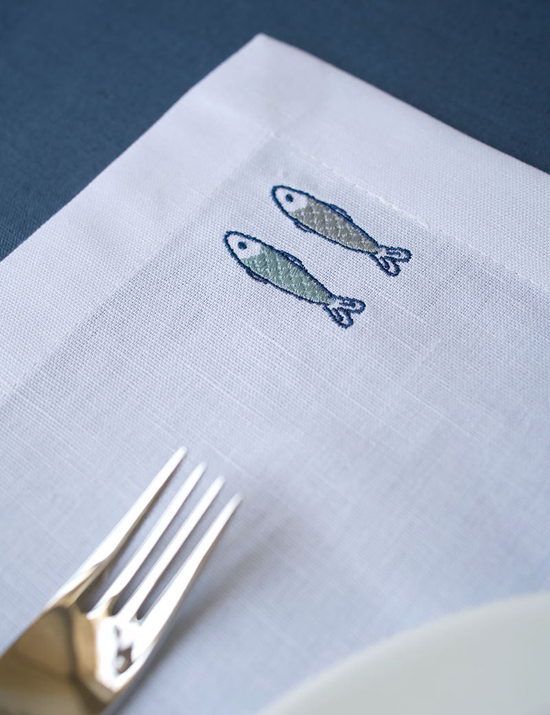 White Linen Placemats with Embroidered Fish